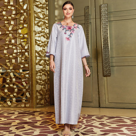 Loose glabiya in light lavender color with medy sleeves and embroidered rounded nick
