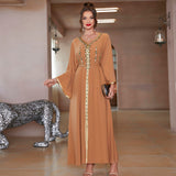 loose galabia crystal studded with long sleeves , and a gold middle line