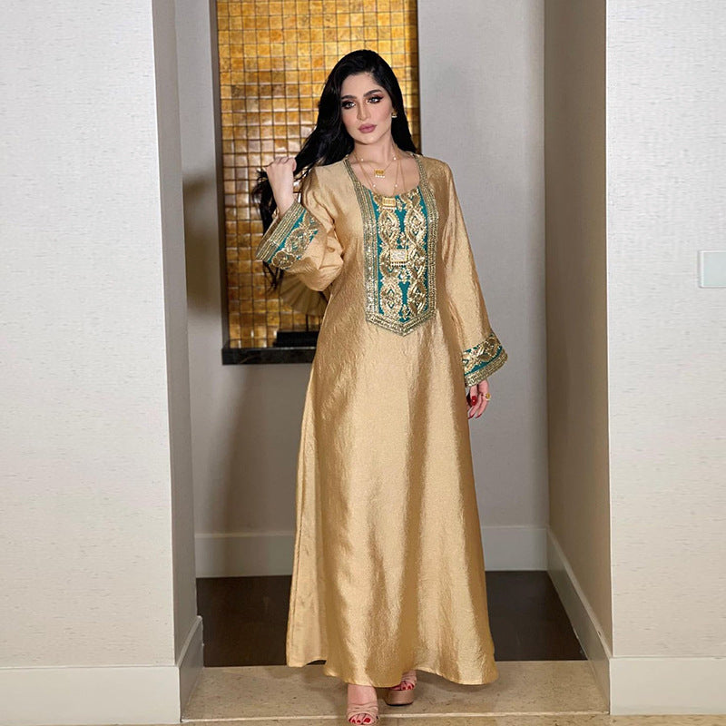 galabia with a long sleeves and gold embroidery