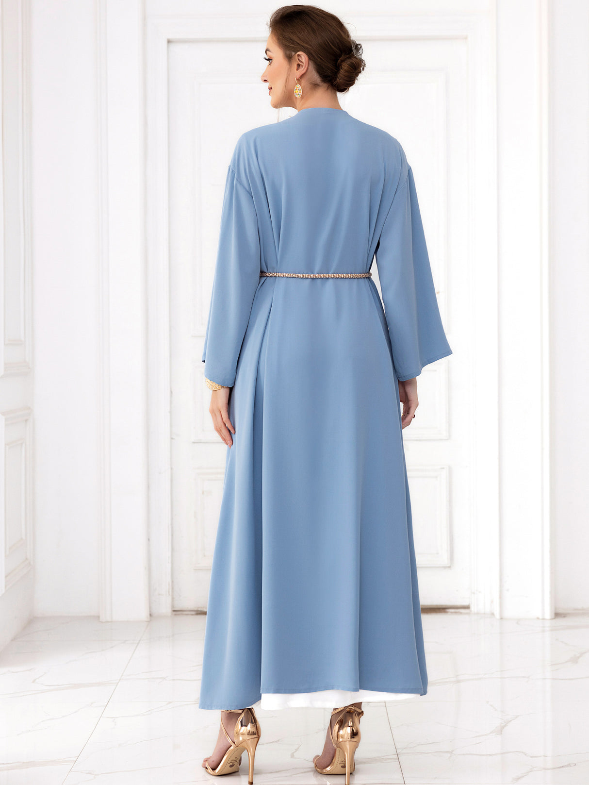glabiya dress with long loose sleeves , tow pieces baby blue color ,with a belt