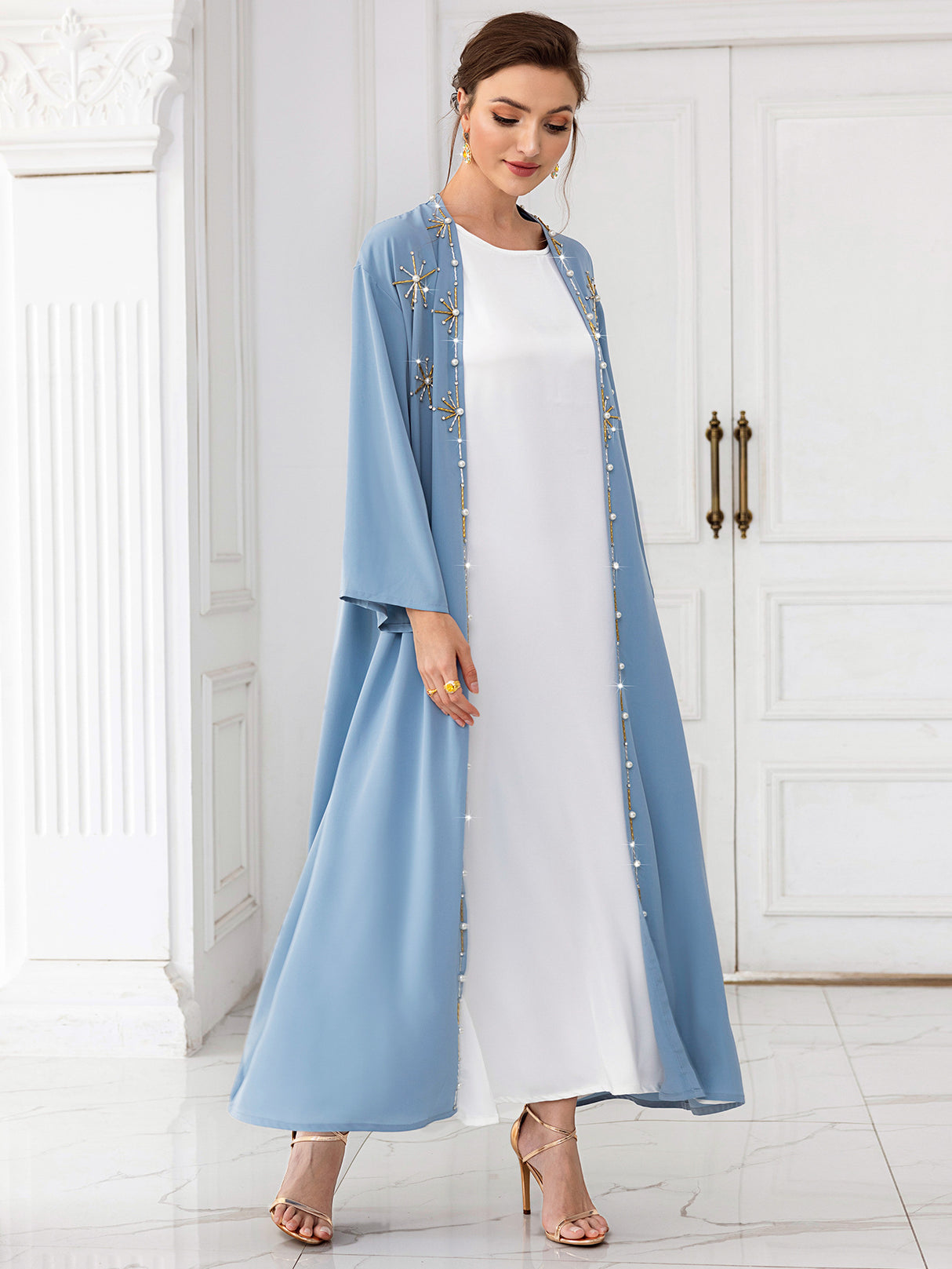 glabiya dress with long loose sleeves , tow pieces baby blue color ,with a belt