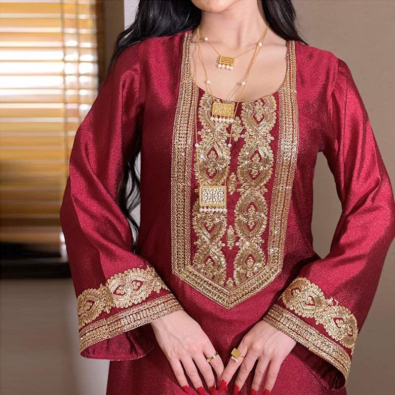 galabia with a long sleeves and gold embroidery