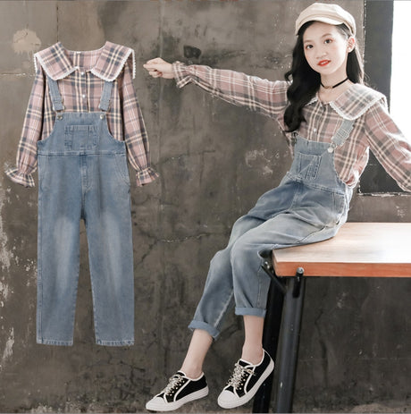 A two-piece set for girls, a faded denim jumpsuit with a front pocket and a check-pattern shirt with a wide collar decorated with a white border and long ruffled sleeves