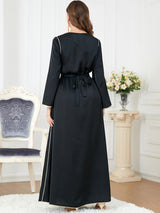 Qaftan glabiya with long sleeves , one piece , black with golden prints and a belt
