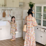 قميص صيفي طويل متناسق للأم والابنة بنمط زهور وأكمام قصيرة منتفخة