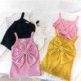 Girls' sleeveless top with a large bow design on the chest