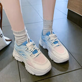 Women's sports running shoes, white, graduated to light colors, with lace-up