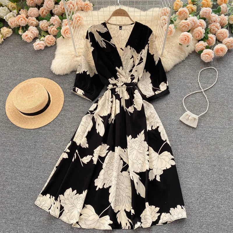 Long casual cross dress with leaf prints and wide midi sleeves
