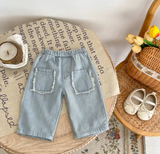 Wide-leg girls' denim pants with prominent front pockets