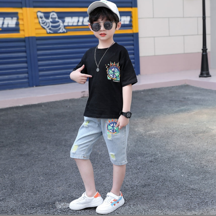 Boys' two-piece set, light sky blue ripped denim shorts and a T-shirt with a large print on the front and a large print on the back.