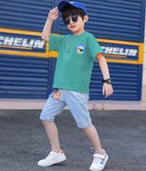 A two-piece set for boys, light sky blue denim shorts with a print on the front and a T-shirt with a print on the front and a large print on the back.