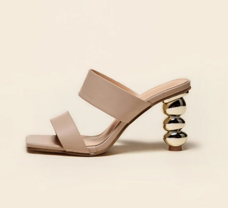 Leather sandal with a unique and distinctive golden heel