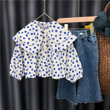 Girls' white shirt with large blue dots, long puffy sleeves, a wide two-layer collar and front buttons, and wide-leg denim pants, a set of two pieces