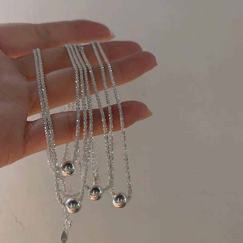 A short necklace with an elegant small ball