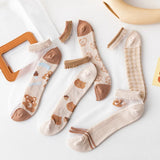 A set of light, short, and transparent home socks in cute teddy bear shapes