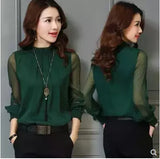 Solid-colored chiffon blouse with a closed neck and semi-transparent long sleeves