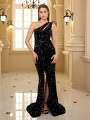 Long, shiny, one-shoulder, sleeveless evening dress with a front leg opening