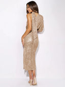 Sequin dress with one lantern sleeve and round neck. Polyester/Spandex