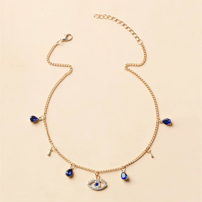 Choker necklace with blue drops and eye design