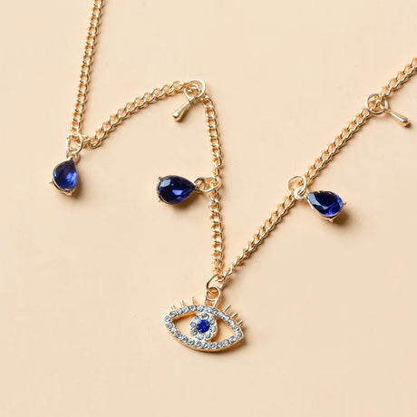 Choker necklace with blue drops and eye design