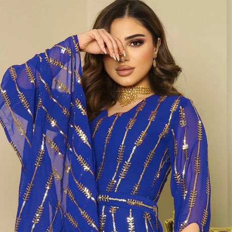 Midi dress with an Arabic style, with long open sleeves and a triangle bust