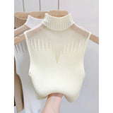 Transparent wool top, with high neck and sleeveless