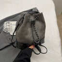 Elegant women's heavy leather backpack with a pull chain closure