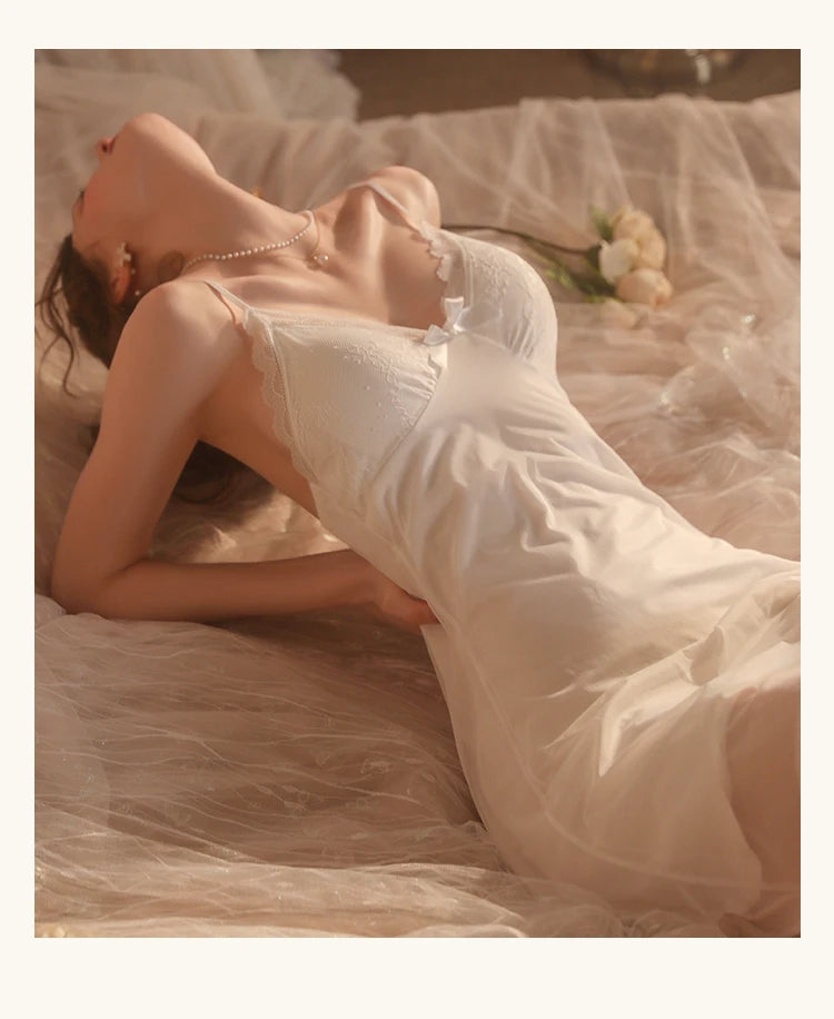 white sleep wear in tow pieces , short dress and midi robe with long sleeves , front buttons and wide colar