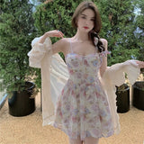 Women's short summer dress with a floral design in light colors
