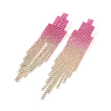 A pair of women's pink diamond long earrings made of crystal and rhinestone