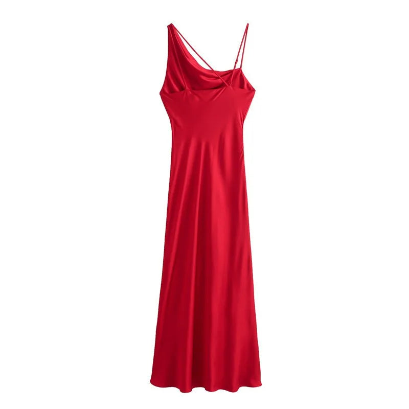 A soft, silky red dress with one shoulder and a delicate rope for the other shoulder