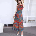 Long sleeveless summer dress with elastic waist and random patterns