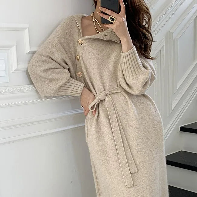 Elegant wool dress with openable high neck, pearl buttons and long sleeves