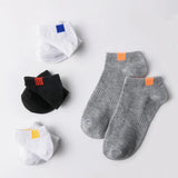 A set of short socks with a practical and neutral design, 5 pairs