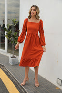 Women's soft summer dress with a square neckline and puff midi sleeves