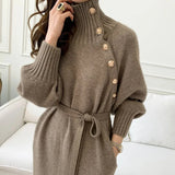 Elegant wool dress with openable high neck, pearl buttons and long sleeves