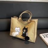 Large canvas shoulder bag with cute cartoon cat prints and furry tails