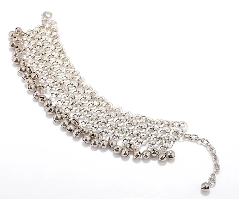 Shiny silver colored anklet with small bells, one piece