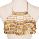 A shiny bohemian body accessory in the form of a crop top with dangling coins