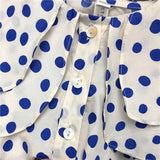 Girls' white shirt with large blue dots, long puffy sleeves, a wide two-layer collar and front buttons, and wide-leg denim pants, a set of two pieces