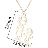 A necklace with a cute design in the shape of a mother and her child