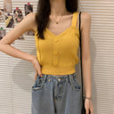 Crop top with a heart-shaped neckline and heart-shaped front buttons in a solid color