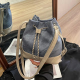 Elegant women's heavy leather backpack with a pull chain closure