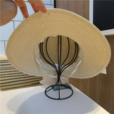 Flexible straw summer hat with ribbon