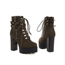 Elegant high heel boot made of velvet with front criss cross straps, side zippers and straps