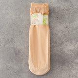 A pair of semi-transparent women's stockings