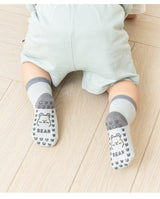 A pair of baby socks with non-slip design in a cute design