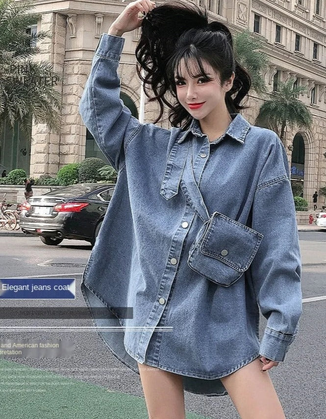 A wide and long denim shirt with front and back buttons and a belt with a denim bag