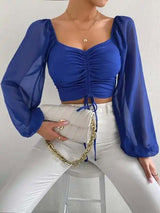 Women's long-sleeved blouse with drawstring , and heart neck line