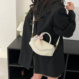Fashionable leather handbag with shoulder strap